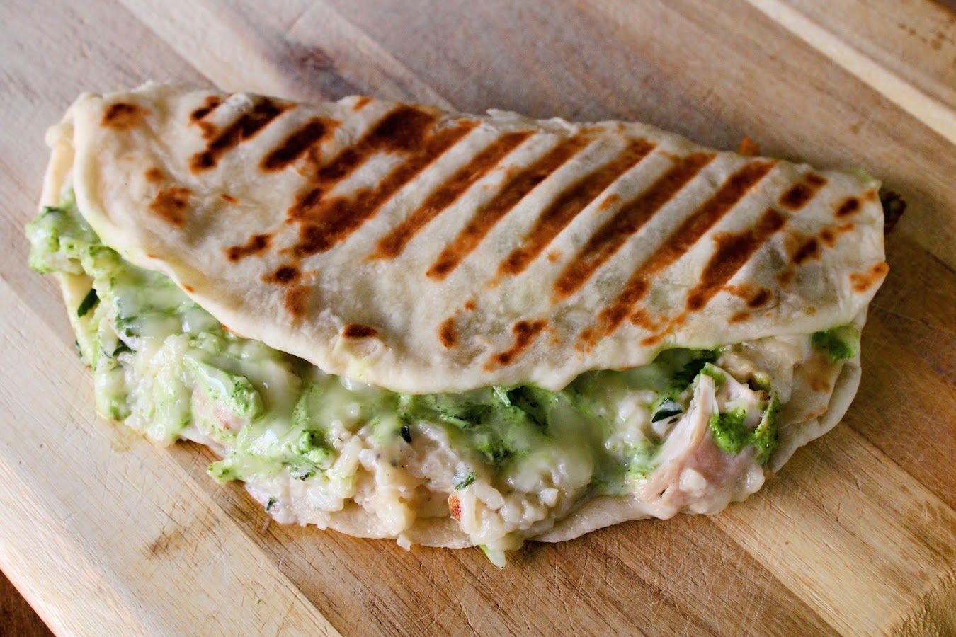 Chicken and rice naanini with a tangy green cilantro sauce