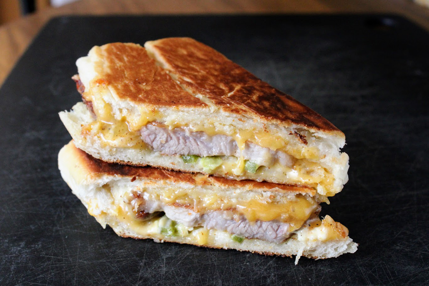 Cheesy pork belly panini
