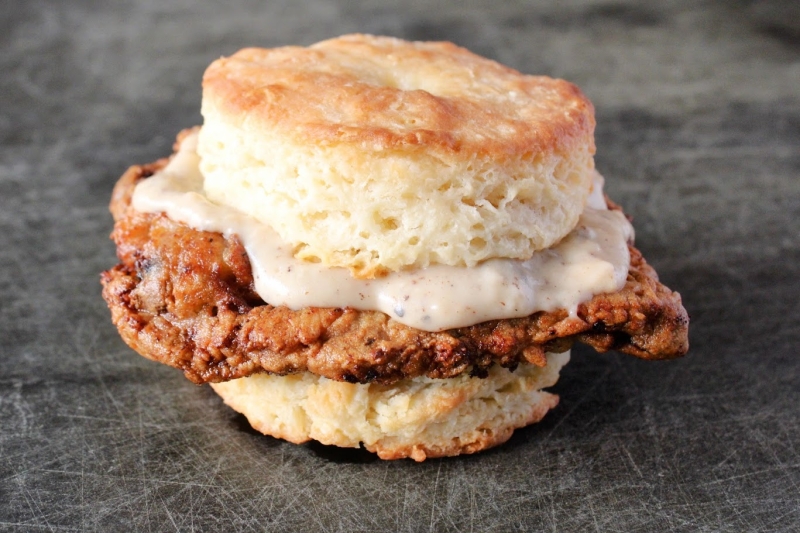 Country-fried smothered steak biscuit sandwich